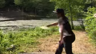 Watch A Disc Golfer Sink Incredible 320-Foot Hole-In-One At Vibram Open
