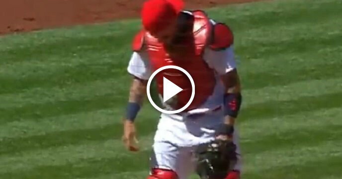 Wild Pitch Somehow Gets Stuck to Yadier Molina's Chest Protector