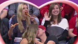  Hawks' Kiss Cam Catches Woman Double-Fisting Pizza 