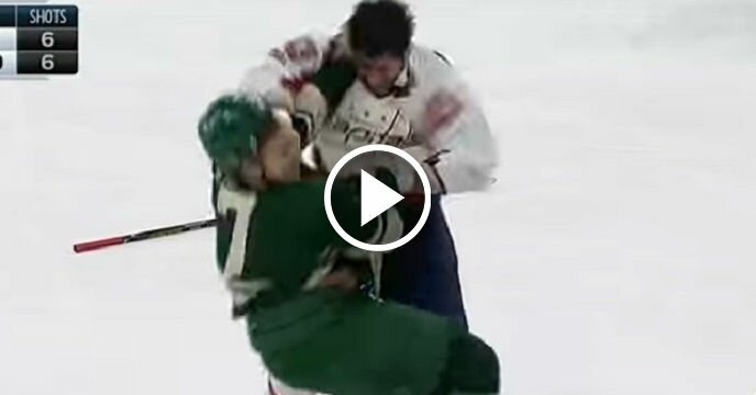 Washington Capitals' Tom Wilson Gets His Face Beat In After Catching Zach Parise With a High Stick