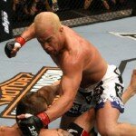 Tito Ortiz punches Ryan Bader during UFC 132 light heavyweight fight