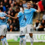 Manchester City players celebrate goal against Hull
