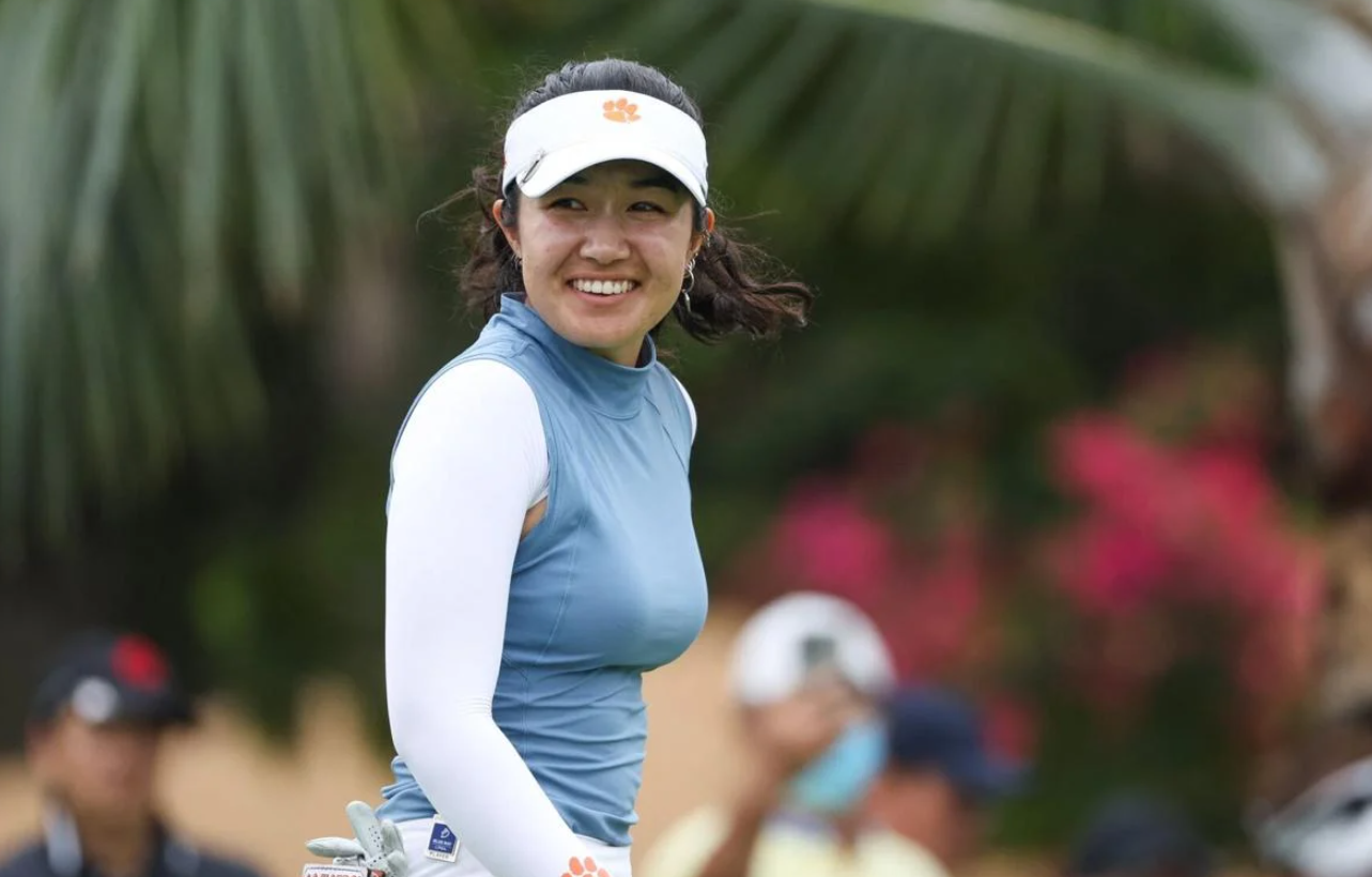 An image showing one of the hot Asian golfers