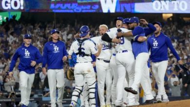 The Los Angeles Dodgers celebrate on the mound