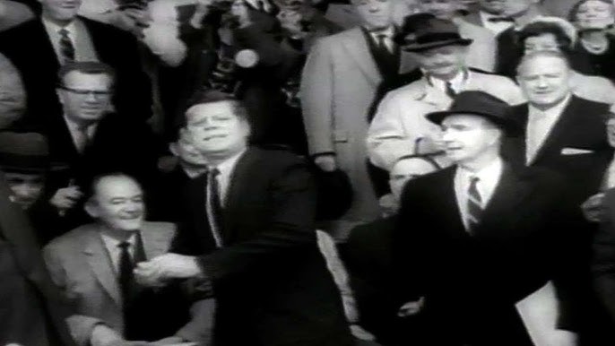 JFK throwing out a first pitch