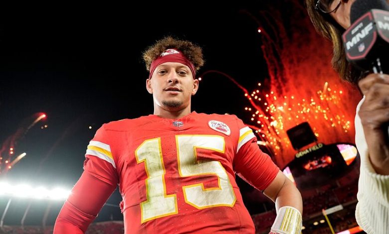 Patrick Mahomes looks down at camera